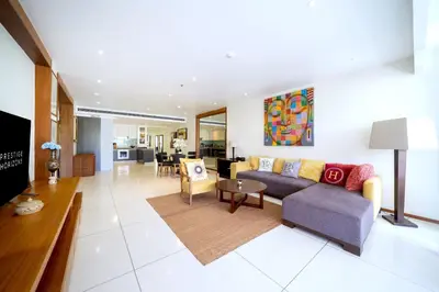 a living room with a couch and a table at Luxury Flat 2BR at CHAVA 5-Star Resort in Surin Beach