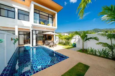 a swimming pool in the backyard of a house at Goldena Twin Private Pool Villas in Kamala Beach