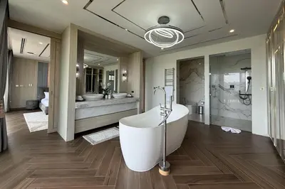 a large bathroom with a large tub and a sink at Villa Lion Phuket in Phuket