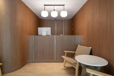 a dining room with a table and two chairs at Summer Sea Phi Phi Island in Phi Phi Don