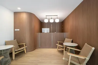 a meeting room with tables and chairs and a podium at Summer Sea Phi Phi Island in Phi Phi Don