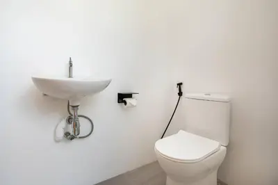 a bathroom with a white toilet and a sink at New, Modern & Stylish 17m Eco Pool Villa Sunset Garden 11 in Rawai in Rawai Beach