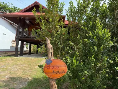 a sign that says church house in front of a house at Chaba House Koh Yao Noi in Ban Laem Sai