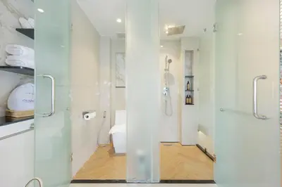 a bathroom with a shower and a toilet at Centara Villas Phi Phi Island in Phi Phi Don