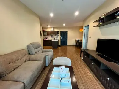 a living room with a couch and a table at Luxury Villa Patong in Patong Beach