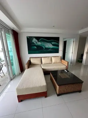 a living room with a couch and a coffee table at Ocean View Residences! in Karon Beach
