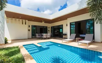 a swimming pool in the backyard of a house at Вилла Boutique Pool Villa с 3 спальнями in Ban Saiyuan (1)