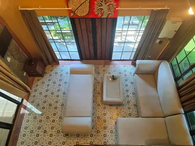 an overhead view of a train with seats and windows at Baibon 4 Homestay Thalang Phuke in Thalang