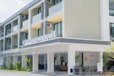 an apartment building with a sign that reads anaheim hotel at Seaside Naithon Phuket - Newly Opened in Nai Thon Beach
