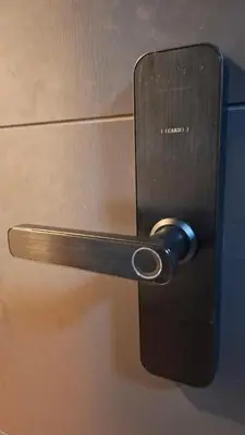 a close up of a doorhandle to a refrigerator at Nordic Hostel I Female Only I Dorms only in Phi Phi Don