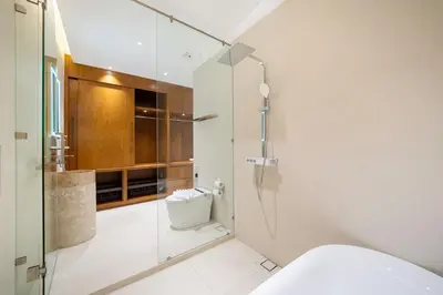 a bathroom with a glass shower and a toilet at Trendy & Minimalist Design 5BR Pool Villa Trinity C1 in Bang Tao Beach