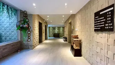 a hallway of a building with a sign on the wall at Heritage - Modern Studio shared Pool, City Centre in Patong Beach