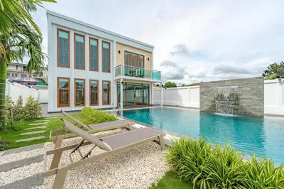 a house with a swimming pool next to a building at V154 Built December 2024 Oasis Great Villa Beautiful in Chalong