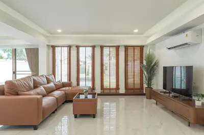a living room with a couch and a tv at V154 Built December 2024 Oasis Great Villa Beautiful in Chalong