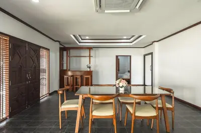 a dining room with a table and chairs at V155 4BR Large Family Villa Chalong in Chalong