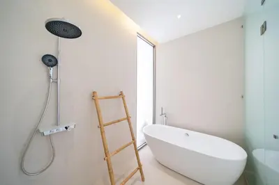 a bathroom with a shower and a white bath tub at Elite Living - Design 3BR Pool Villa in Newly Built LuxPride 4 L6 Residence in Bang Tao Beach