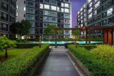 a swimming pool in the middle of a building at Luxury Residence in Phuket Center in Phuket Town