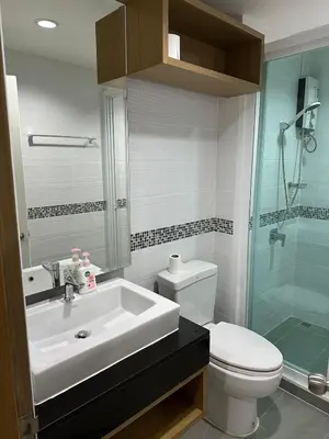 a bathroom with a sink and a toilet and a shower at Luxury Residence in Phuket Center in Phuket Town