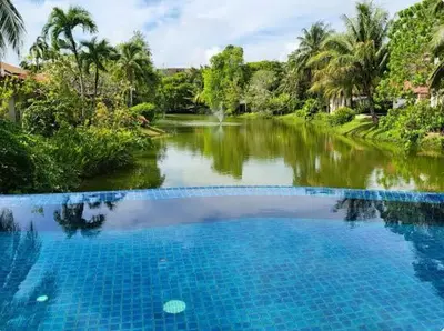 a swimming pool in the middle of a river at Heavenly place in Surin Beach
