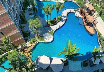 an overhead view of a pool at a resort at The Title Residencies Naiyang in Phuket