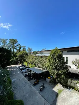 an overhead view of a group of tables and chairs at The Title Residencies Naiyang in Phuket