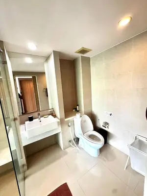 a bathroom with a toilet and a sink at Ark Studio only 10 Minutes from kataKaron Beach in Karon Beach