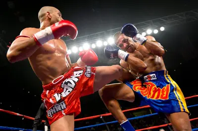 two men are boxing in a boxing ring at Songbird Suites - Deluxe King Suite and Scooter in Ao Nang Beach