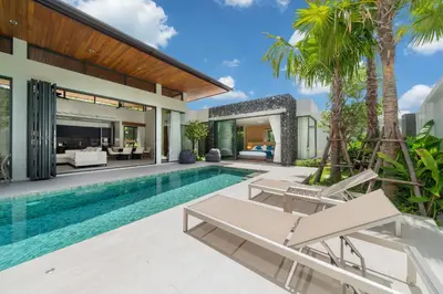 an image of a swimming pool in a villa at Bang Tao Botanica Modern Loft 3 bd in Ban Pak Lak
