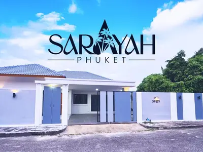 a white house with the words sarani phuket at Sarayah Phuket 4Bed Villa in Ban Tha Rua