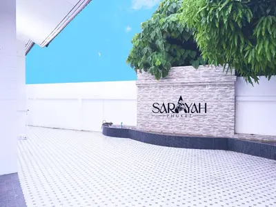 a sign on the side of a building at Sarayah Phuket 4Bed Villa in Ban Tha Rua