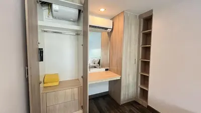 a small bathroom with a sink and a mirror at Condo Loft style pool access 001 in Rawai Beach