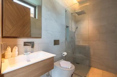 a bathroom with a toilet and a sink and a shower at V157 Brand New Beautiful Dream Villa in Kamala Beach