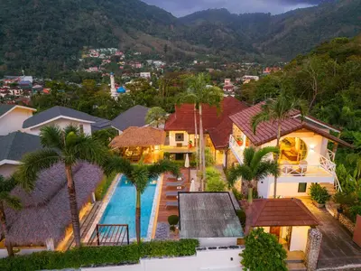 an aerial view of a house with a swimming pool at kamala 1000 sqm new luxury 4 bedroom holiday pool villa extra large space amazing sunset in Kamala Beach