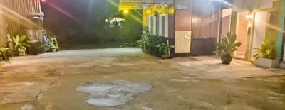 a room with a puddle of water on the ground at Nu Bamboo Backpacker in Phuket