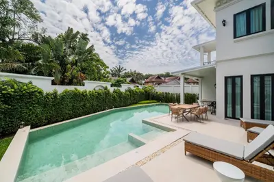 an image of a villa with a swimming pool at Fifth Element Pool Villas by NLA in Bang Tao Beach