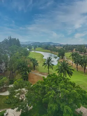 an aerial view of a golf course with a lake at 1BDR Laguna 10 min to the Sea Roof Pool in Laguna Phuket