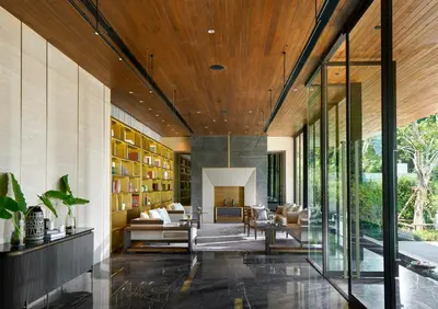 a living room with a wooden ceiling and glass walls at Phuket V Building 19 Villas with Andaman Sea View Private Swimming Pool and Spa in Ban Ao Makham