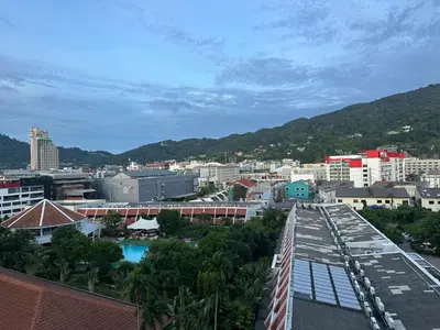 a view of a city with buildings and a bridge at Patong tower mountain view m705 in Patong Beach