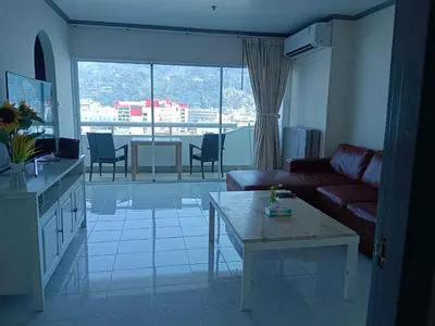 a living room with a couch and a table at Patong tower mountain view m705 in Patong Beach