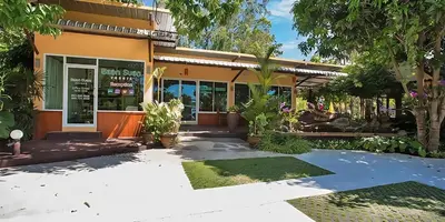 a house with a lot of plants in front of it at OYA International Resort Phuket \u666e\u5409\u5c9b\u6b27\u96c5\u56fd\u9645\u5ea6\u5047\u9152\u5e97 in Phuket Town