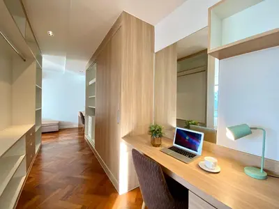 a home office with a desk with a laptop on it at 650m to beach condofast WiFi in Kamala Beach