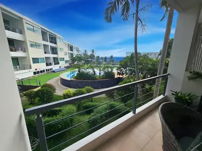 a balcony with a view of a resort at C162 Sea View 8 Minuets to Patong Karon Butter Fly in Karon Beach