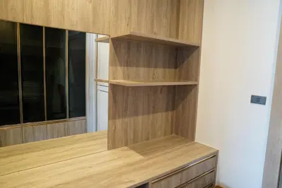 a kitchen with wooden shelves and a window at Zenithy Villas 3BD in Phuket