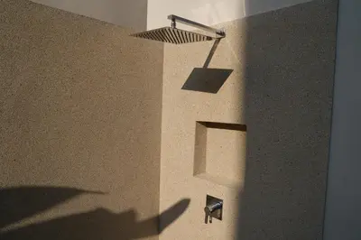 a shadow of a shadow of a lamp on a wall at Zenithy Villas 3BD in Phuket