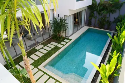 an overhead view of a swimming pool in a house at Zenithy Villas 3BD in Phuket