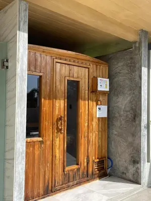 a wooden entry door to a house at Prime Location46 sqm Room, King-Size Bed in Ao Nang Beach