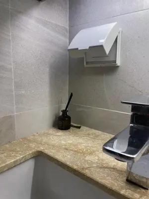 a kitchen counter with a sink and a light at Prime Location46 sqm Room, King-Size Bed in Ao Nang Beach