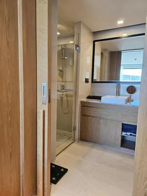 a bathroom with a shower and a sink at La Vita 5 Stars Great 1 Bdr 3 Pool in Phuket Town
