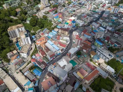 an overhead view of a city with buildings and roads at Ocean and Mountainviews, 2 Balconies in Patong Beach