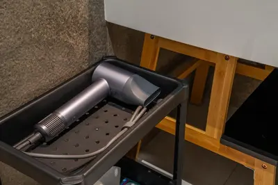 a hairdryer in a box on a table at Title Halo I love Asia Naiyang Pool Gym in Nai Yang Beach
